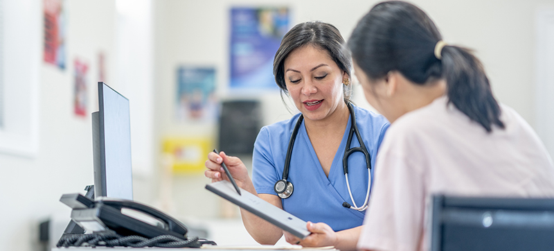 Female provider speaking to a patient